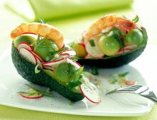 Avocado with shrimp filling on plate