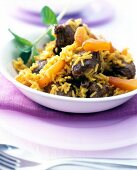 Close-up of Lammpilaw with carrots in bowl