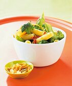 Close-up of penne pasta with broccoli in bowl