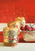 Panettone and marzipan cherries wrapped with gold paper