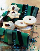 Star shaped coconut and jelly cookies in green gift box