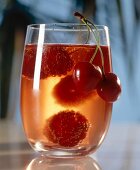 Cherries in glass of water