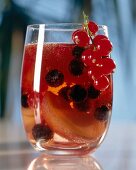 Nectarines and currants punch in glass