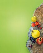 Different types of fruits on stone ledger