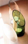 Close-up of green and white lanterns with tea light candles