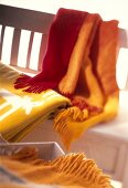 Close-up of yellow blanket printed with white moose