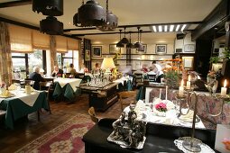 Interior of restaurant with laid tables in Germany