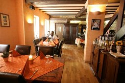 Interior of restaurant with laid tables in Germany