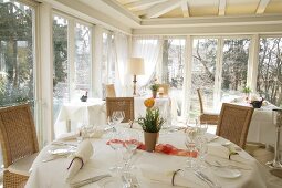 Interior of restaurant with laid tables and bar in Germany