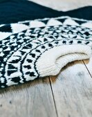 Close-up of black and white Norwegian styled sweater