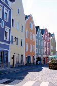 View of facade bof colourful houses and street in Passau, Germany