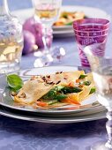 Cr�pes with asparagus and carrot ragout on plate