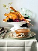 Turkey with sea buckthorn sauce and red cabbage salad on cake stand
