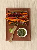 Marinated carrots served with coriander pesto, overhead view