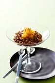 Chocolate risotto with tangerine spice granita in coupe glass