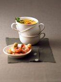 Shrimp and carrot soup in cup