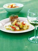 Cucumber and pepper ragout on plate