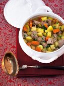 Turnip and lamb stew in serving dish