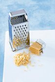 Grated almond bar with grater