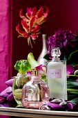 3 versch. Parfumflakons: "Rumeur", "Le De", "Cabotine", pink, rosa