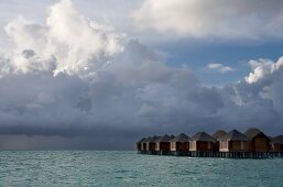 View of bungalows in the water, Dhigufinolhu island, Maldives