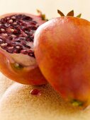 Close-up of two halves of pomegranate