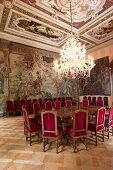 Large dining room with chandelier in St. Emmeram Castle in Regenburg, Germany