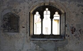 View of houses through window of Baumburger Tower in Regensburg, Germany