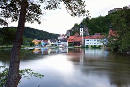 View of Naab river and medieval village of Kallmunz, Bavaria, Germany
