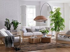 Living room with wooden furniture, carpet and plants