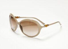 Sonnenbrille in Nude-Tönen von Gucci 