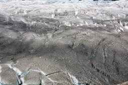 Hikers in Aletsch Glacier, Marjelesee, Valais, Switzerland