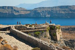 Tourists at Venetian fortress in Crete, Greek 