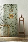 Partition with oak leaf pattern on white wall