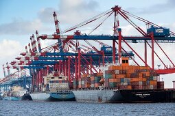 Containers being loaded on ship with cranes, Bremerhaven, Bremen, Germany