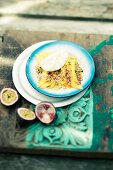 Mango gratin with coconut ice cream and passion fruit