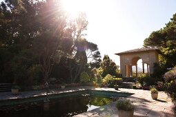 View of Ilnacullin Italian Garden surrounded with trees, Ireland, UK