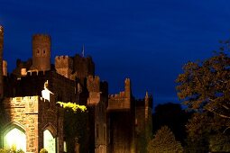 View of Ashford Castle and blue sky at dusk, Ireland, UK