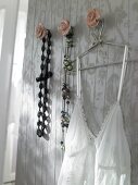 Hanger on porcelain hooks in form of rose petals