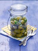 Marinated olives in a preserving jar