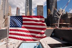 American flag and Ground Zero construction site in New York, USA