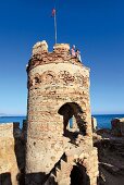 Tourists on tower of Mamure Castle in Anamur, Mersin Province, Turkey