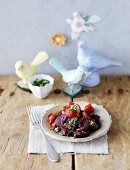 Braised aubergines and tomatoes with mint pesto