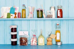 Various homemade, edible presents on a shelf