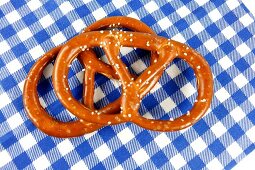 Two pretzels on checked napkin
