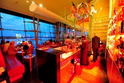 People dining at Le Ciel Restaurant Bar & Lounge in Le Royal Meridien, Hamburg, Germany