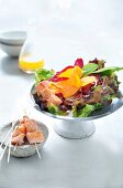 Sweet potato, salmon and beetroot salad with skewered salmon