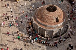 Tourists around Onofrio Fountain in Dubrovnik, Croatia, elevated view
