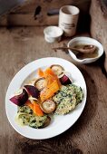 Rice cakes on a warm vegetable salad