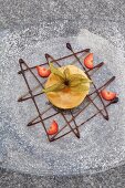 Semifreddo with toasted corn flower on glass plate, overhead view